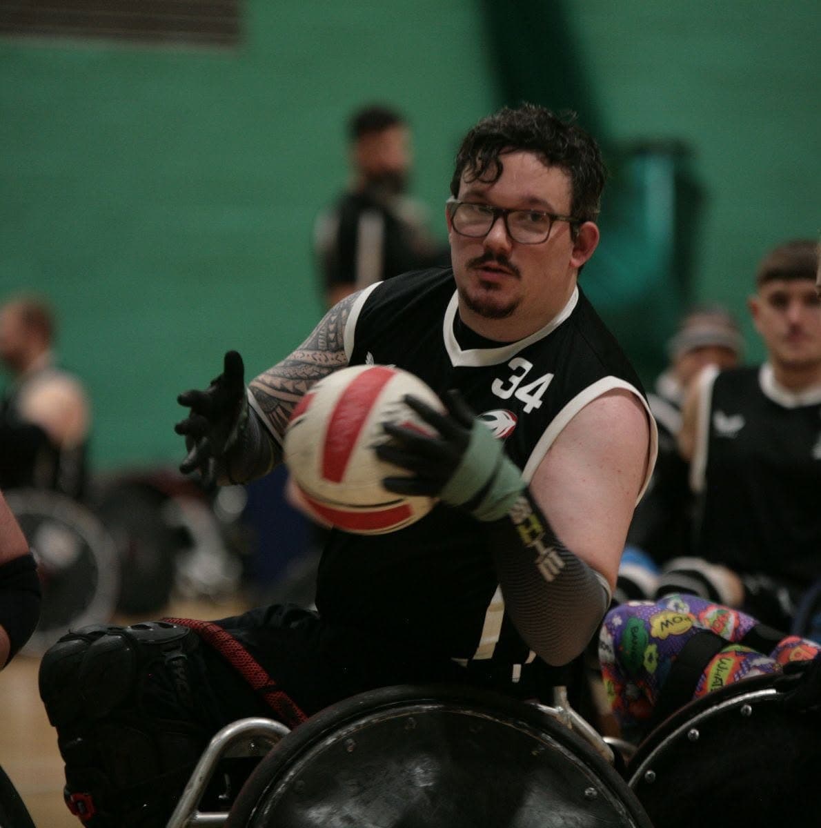 Luke Collier competing in wheelchair rugby.